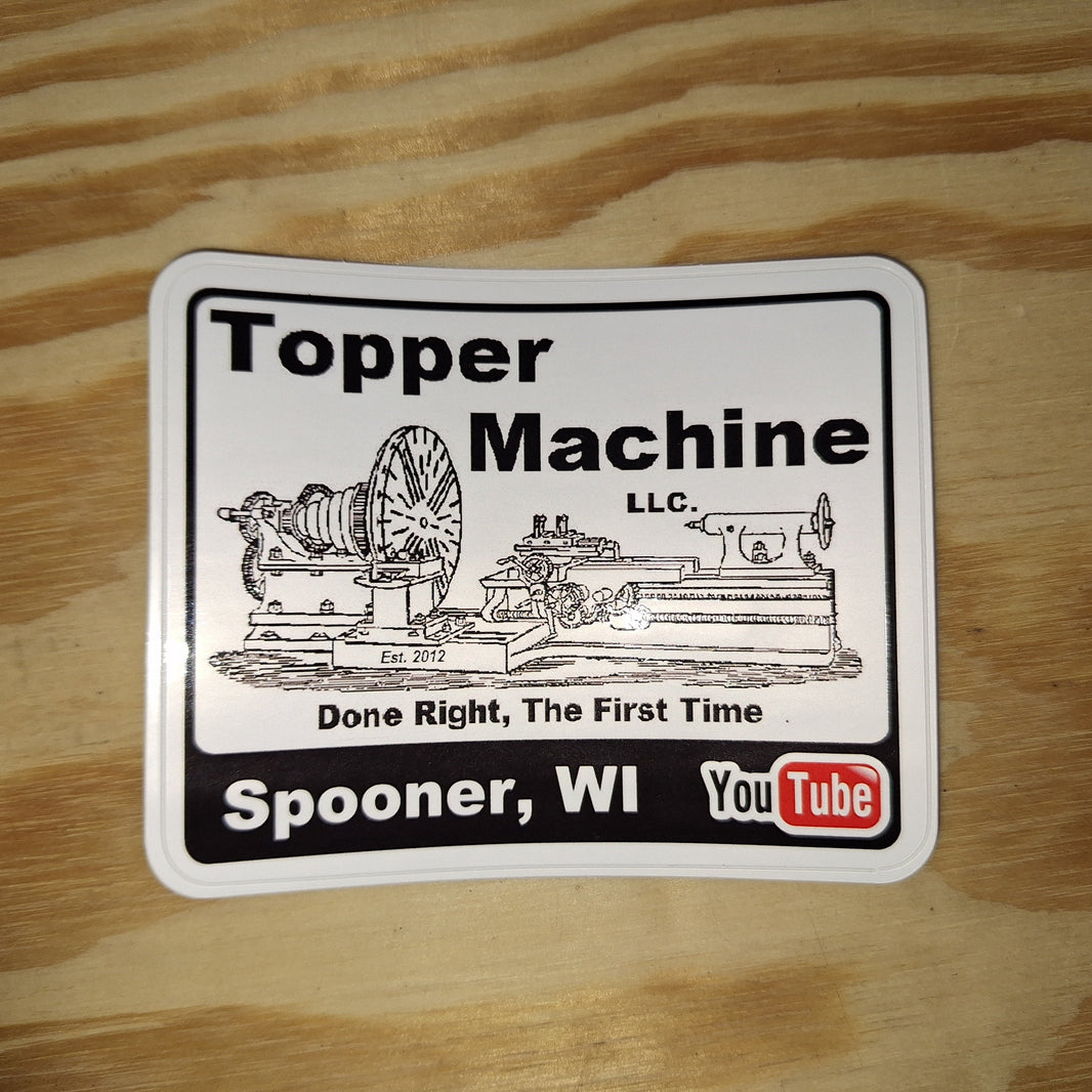 Topple Machine Signage Topper Machine LLC